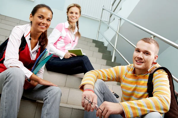 Sitting on stairs — Stock Photo, Image