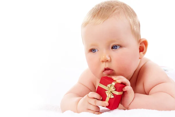 Bebé con regalo —  Fotos de Stock
