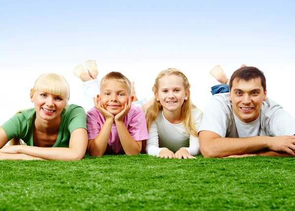 Family on lawn — Stock Photo, Image