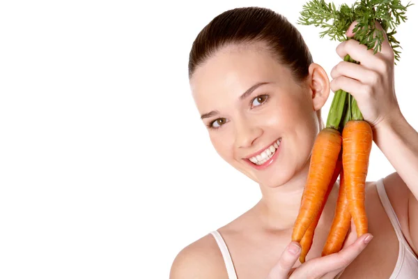 Girl with carrots — Stock Photo, Image