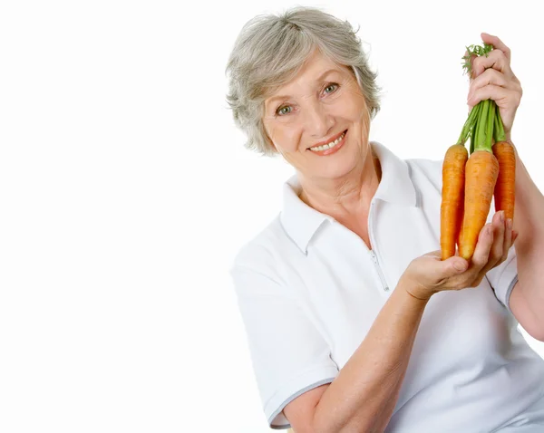 Agricultor con zanahorias — Foto de Stock