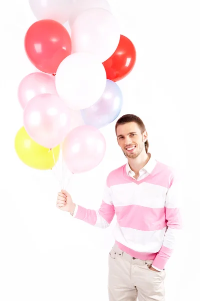 Человек с воздушными шарами — стоковое фото