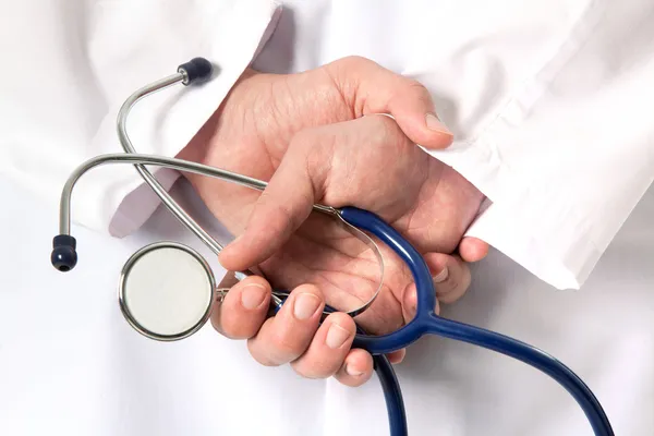 Stethoscope in hands — Stock Photo, Image