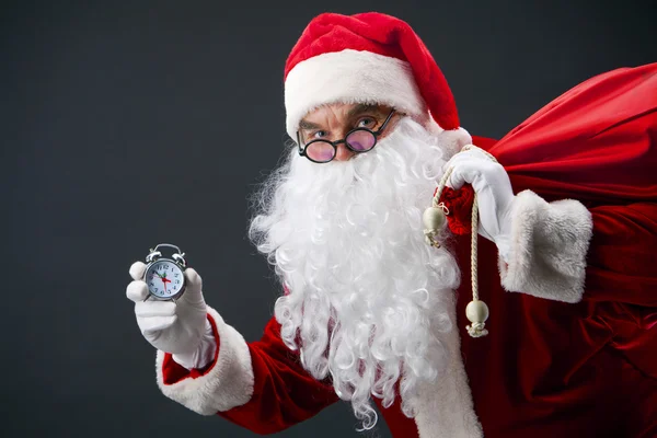Weihnachtsmann mit Uhr — Stockfoto