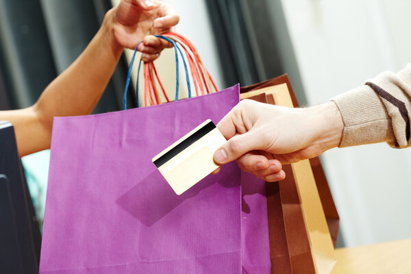 Passing credit card — Stock Photo, Image