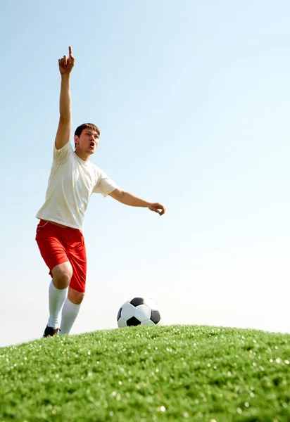 Soccer player shouting — Stock Photo, Image