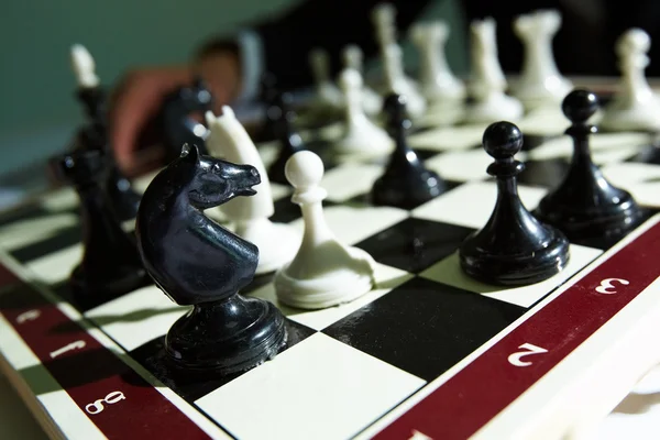 Šachové figury na palubě — Stock fotografie