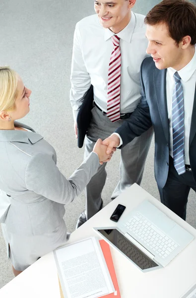 Handshaking partners — Stock Photo, Image