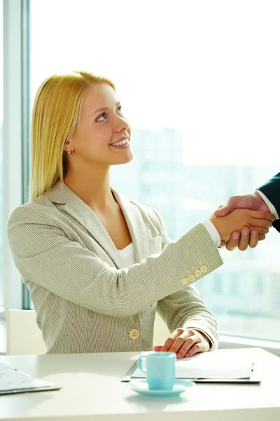 Handshaking woman Royalty Free Stock Images