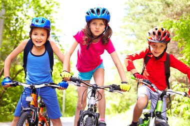 Children on bikes clipart