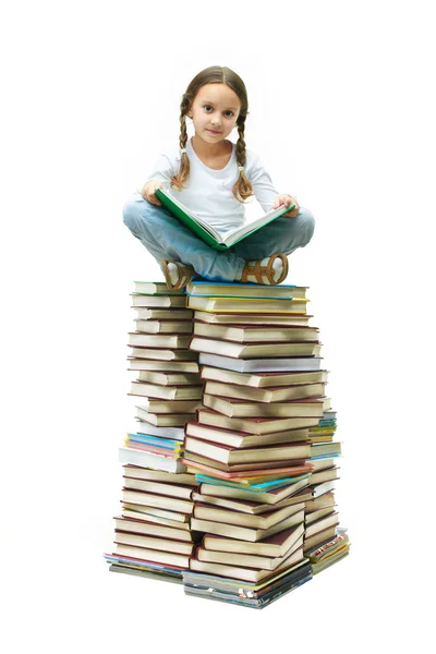 Menina em livros — Fotografia de Stock