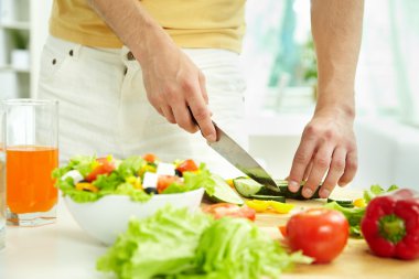 Cutting cucumber clipart