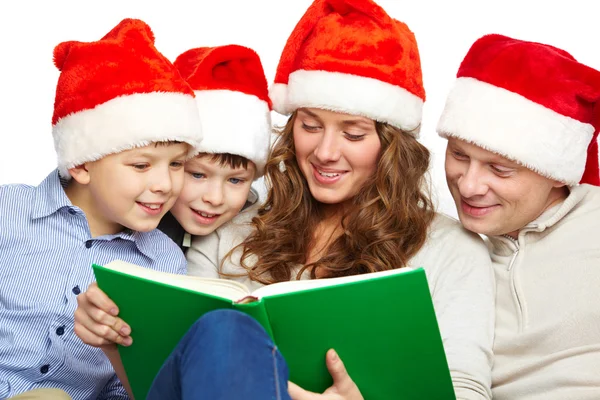 Weihnachtsmänner lesen — Stockfoto