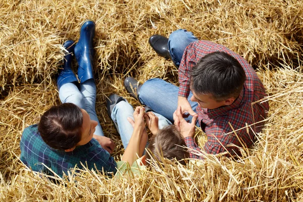 Farmers on hay — Stock Photo, Image