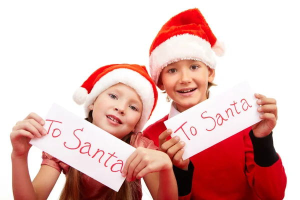 Happy children holding letters with note "To Santa" — Stock Photo, Image
