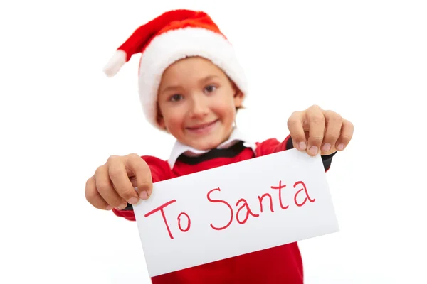 Happy lad holding letter with note "To Santa" — Stock Photo, Image