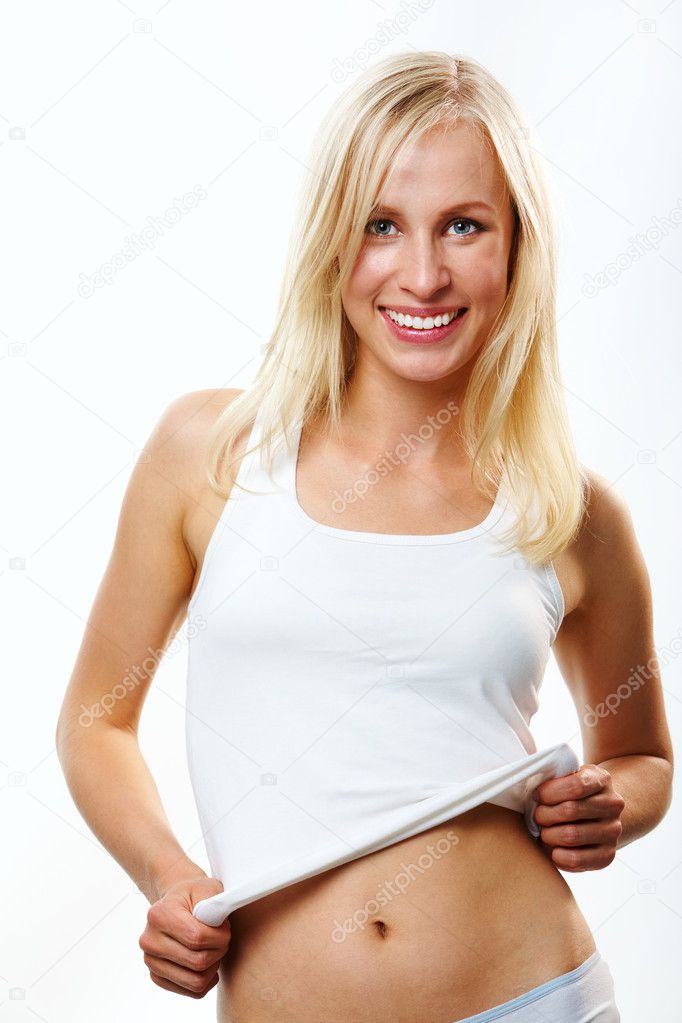 Young woman in underwear measuring her waist Stock Photo by Pressmaster