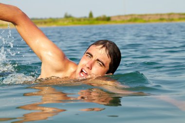 Guy swimming clipart