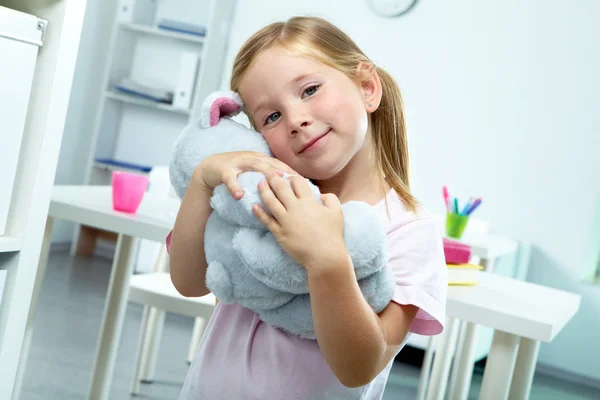 Girl with toy — Stock Photo, Image