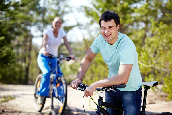 Man with a bike — Stock Photo, Image