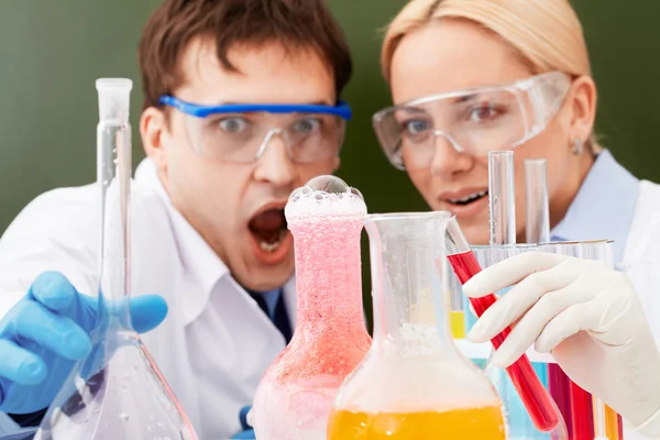 Surprised chemists — Stock Photo, Image
