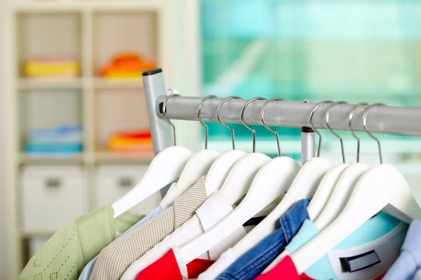 Clothes on hangers — Stock Photo, Image