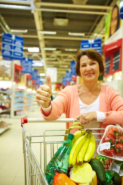 Woman with goods — Stock Photo, Image