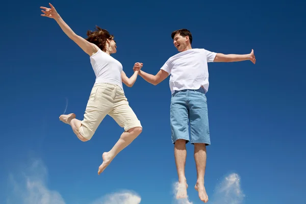 Jumping couple — Stock Photo, Image