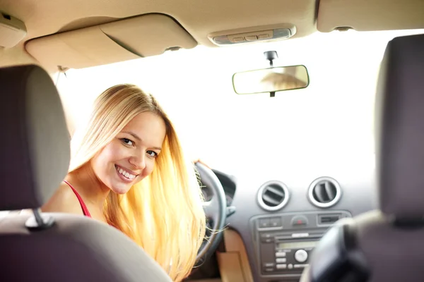 Girl in a car — Stock Photo, Image