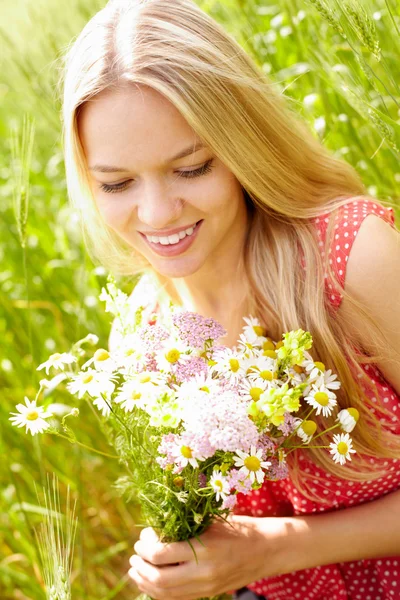 Female with flowers — Stock Photo, Image