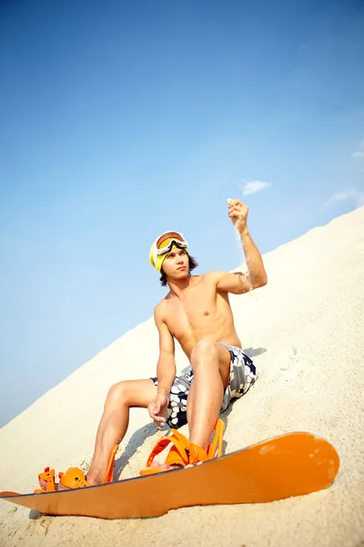 Sandboarden rider — Stockfoto