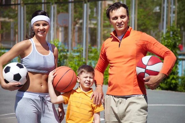Family with balls — Stock Photo, Image