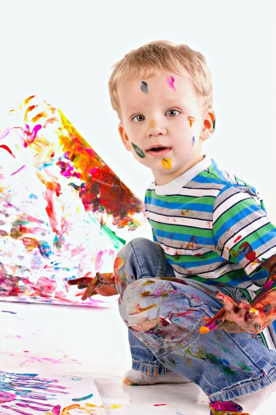 Happy kid is drawing picture — Stock Photo, Image