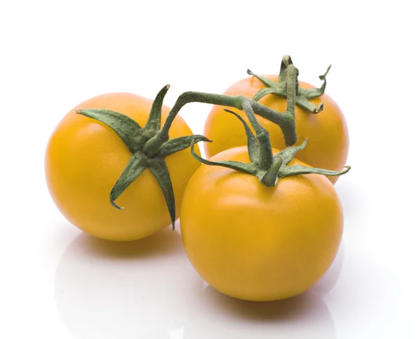 stock image Three yellow tomatos