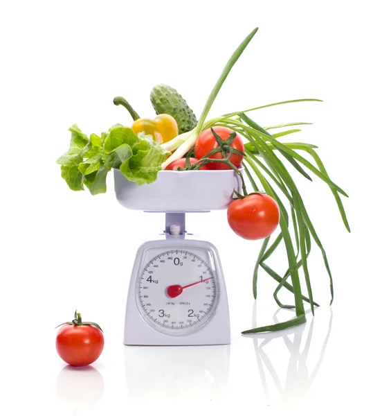 Healthy food on weights — Stock Photo, Image