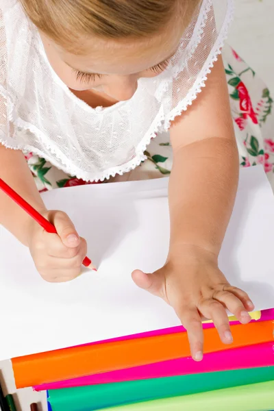 Beautiful little girl drawing with pencil — Stock Photo, Image