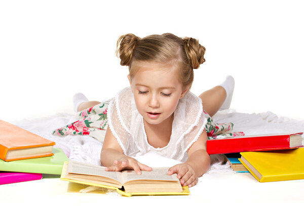 Little girl reading book
