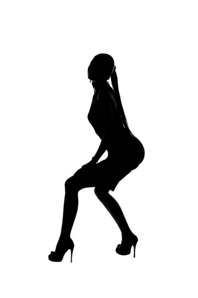 Silhouette einer schönen tanzenden Frau — Stockfoto