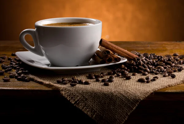 Still-life with espresso and cinnamon — Stock Photo, Image