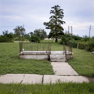 Remaining steps and railing of house after Hurricane Katrina, New Orleans, Louisiana clipart