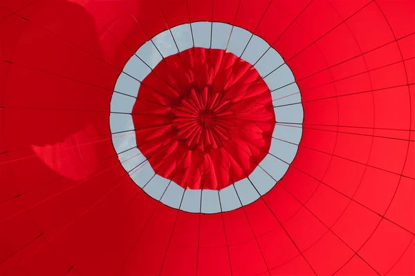 stock image Low angle view of inside a red hot air balloon