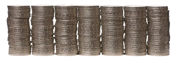 Hromádky 2 euro mincí před bílým pozadím — Stock fotografie