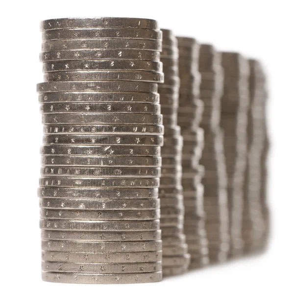 Stacks of 2 Euros Coins in front of white background — Stock Photo, Image