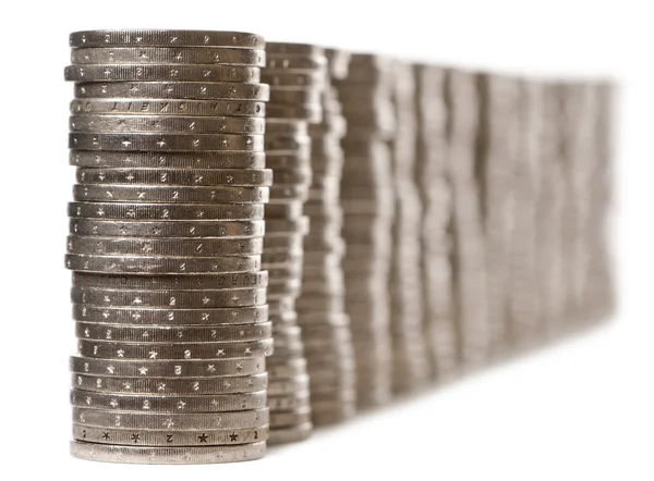 stock image Stacks of 2 Euros Coins in front of white background