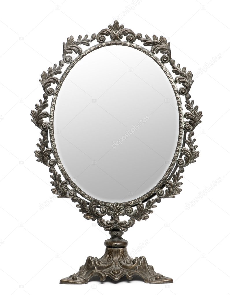 Antique mirror in front of white background