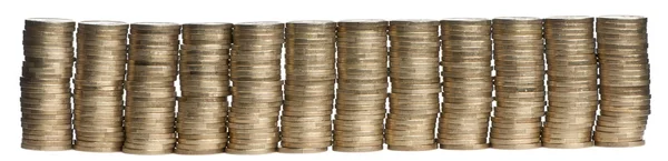 Στοίβες των κερμάτων σε ευρώ 1 μπροστά από το λευκό φόντο — Φωτογραφία Αρχείου