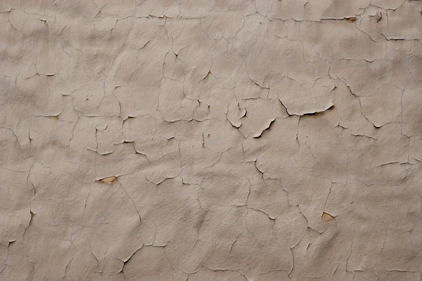 Gamla väggen med knäckt stuckatur — Stockfoto