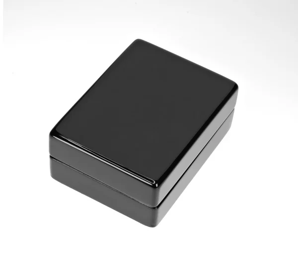 Black polished gift box isolated on white — Stock Photo, Image