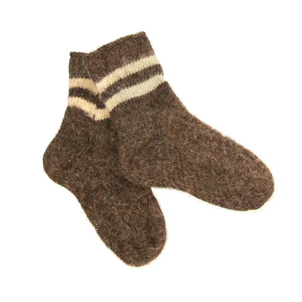 Par de calcetines calientes de lana aislados en blanco Imagen de stock