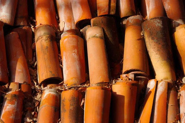 Pile of old roof tiles on sun light Royalty Free Stock Photos
